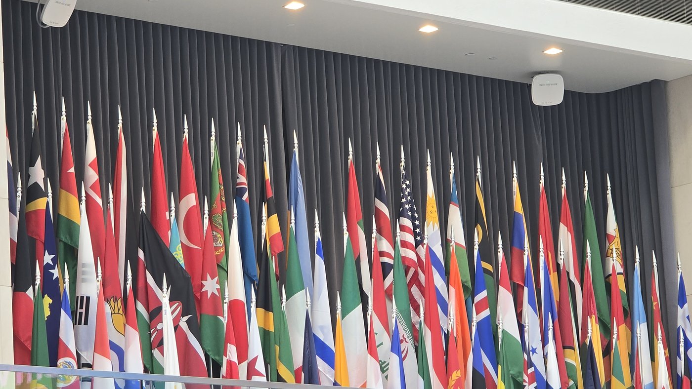 National flags of countries from across the world displayed together